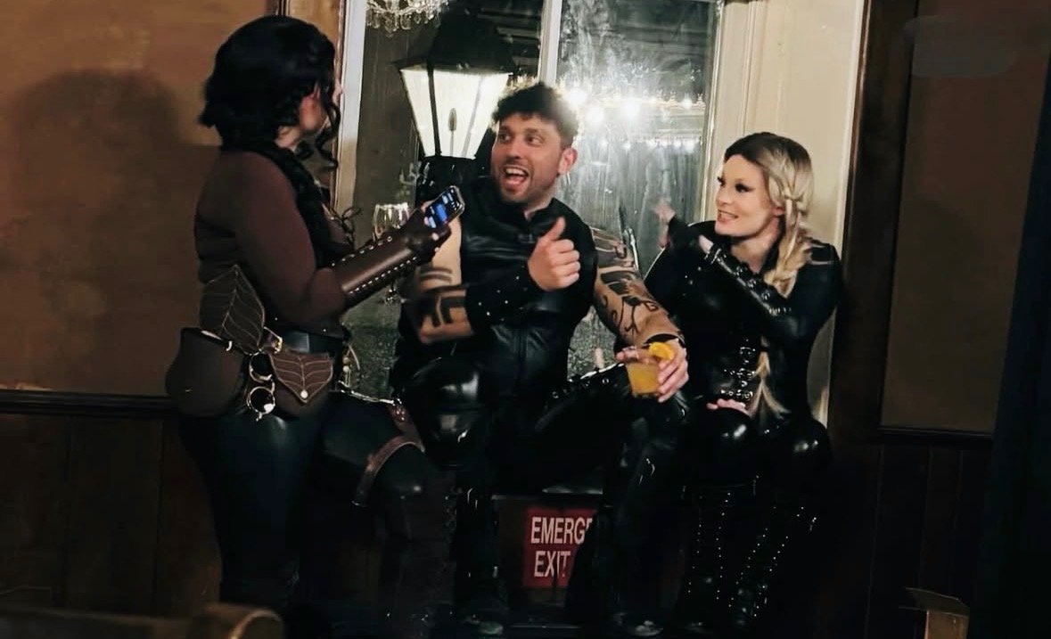 Character-inspired guests laughing at Dragon Riders Weekend and Gala