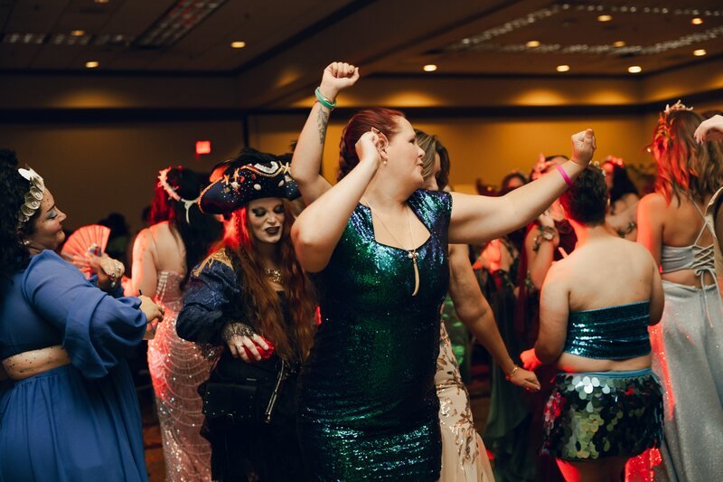 Costumed guests dancing at the Saturday night ball